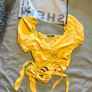 Cropped tie yellow blouse